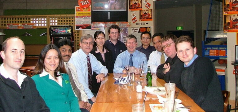 Paul Hughes with his staff at Practical Education Institute in New Zealand