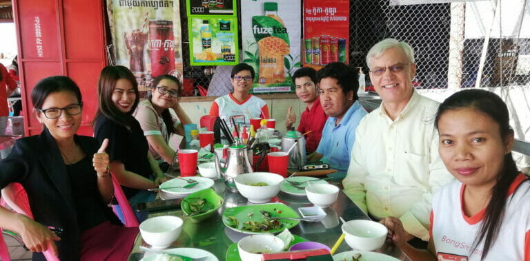 Paul Hughes with Bong Thom staff